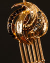 Pendientes Escultóricos de Flecos y Nudo Dorado
