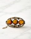 Broche Austrohúngaro "Tríptico de Citrinos" en Plata Dorada