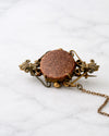 Broche victoriano con piedra goldstone