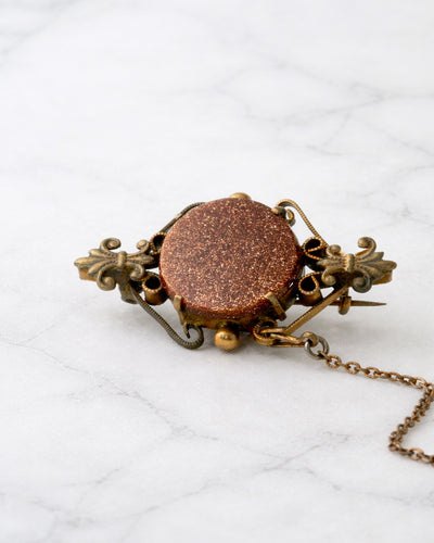 Broche victoriano con piedra goldstone